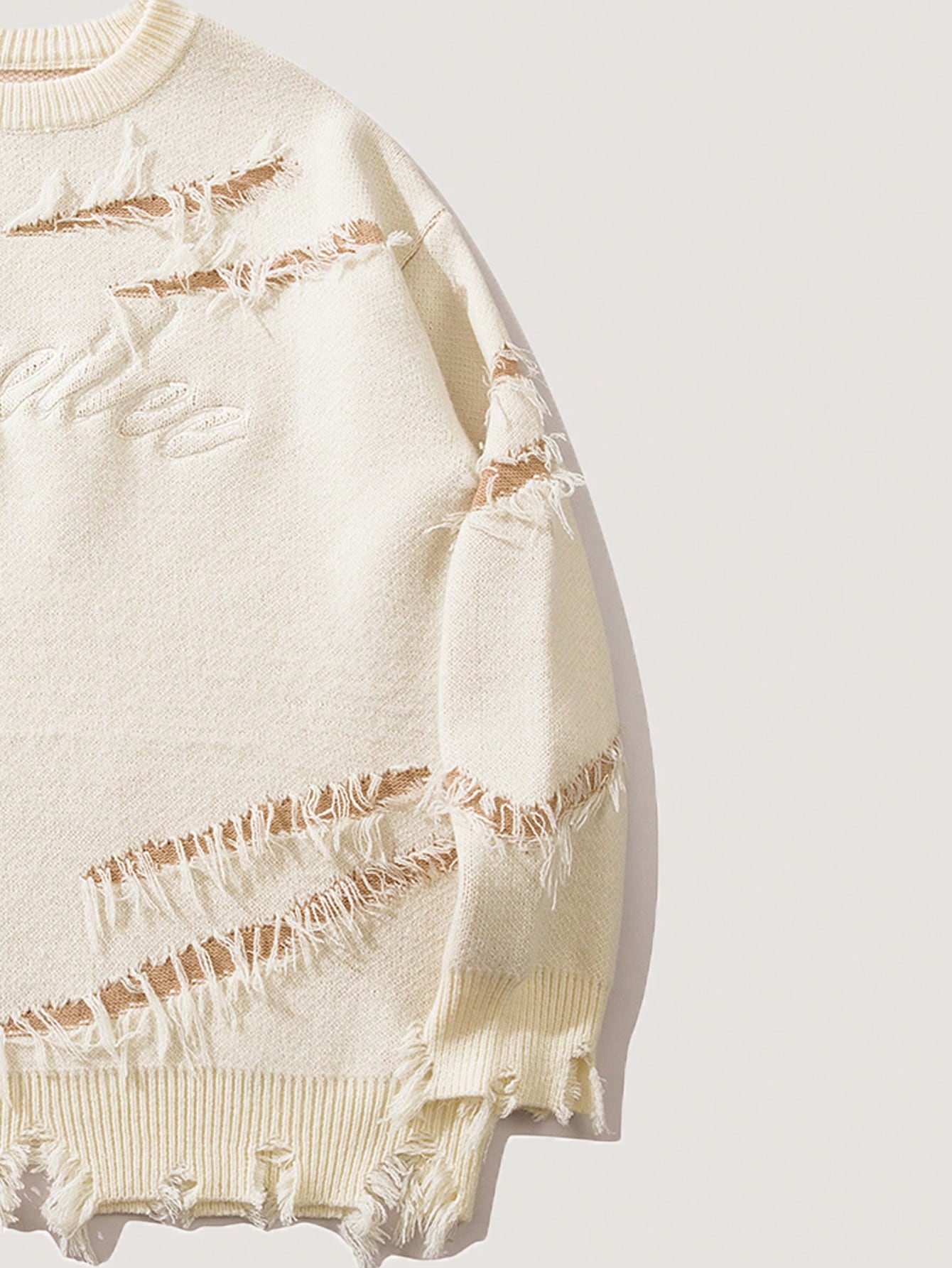 ANDREILEE EMBROIDERED LETTERS, TORN HOLES, TASSEL SWEATER
