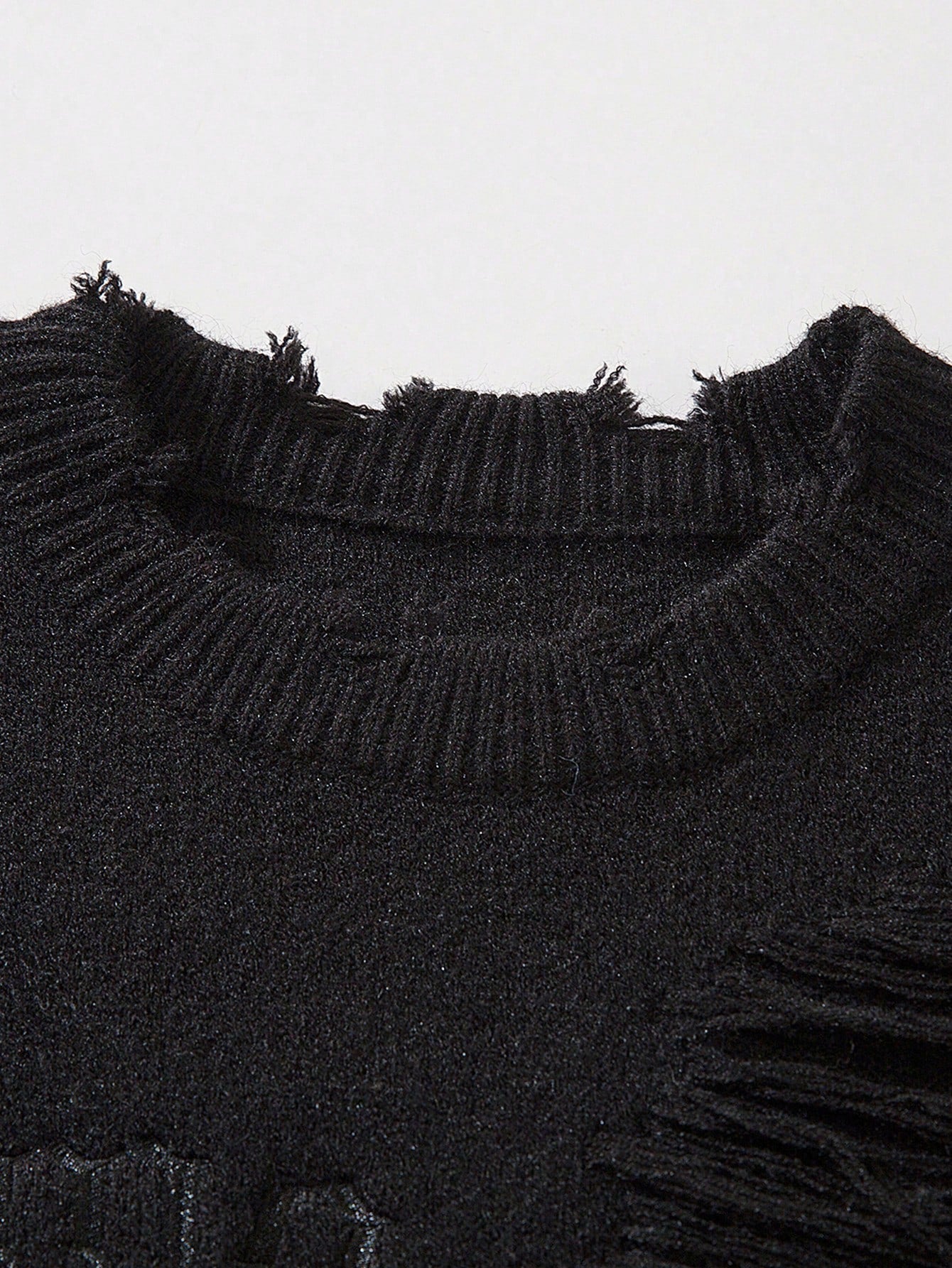 ANDREILEE EMBROIDERED LETTERS, TORN HOLES, TASSEL SWEATER