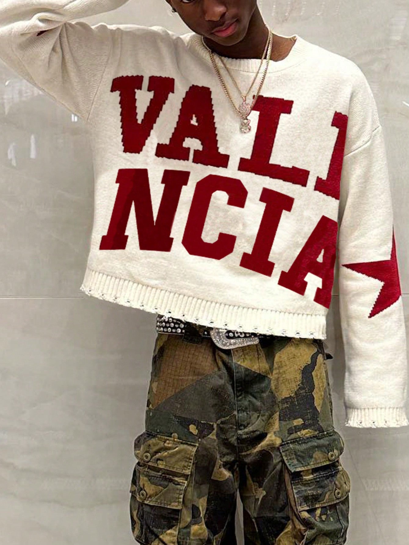 ANDREILEE LETTER-PATTERNED DISTRESSED SWEATER