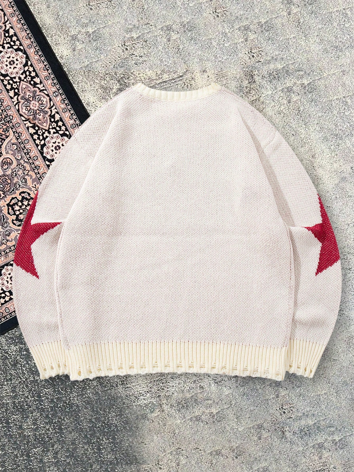 ANDREILEE LETTER-PATTERNED DISTRESSED SWEATER