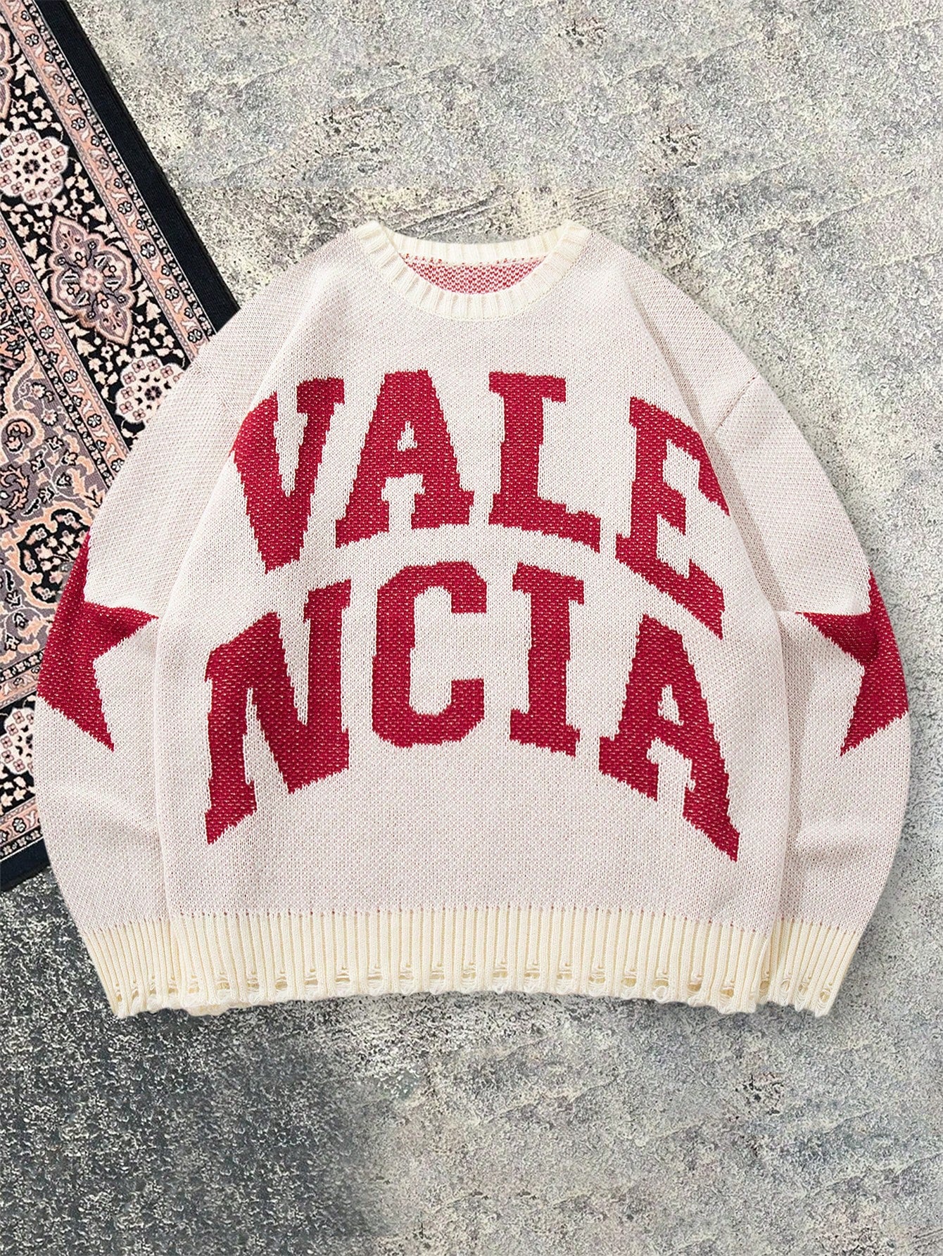 ANDREILEE LETTER-PATTERNED DISTRESSED SWEATER