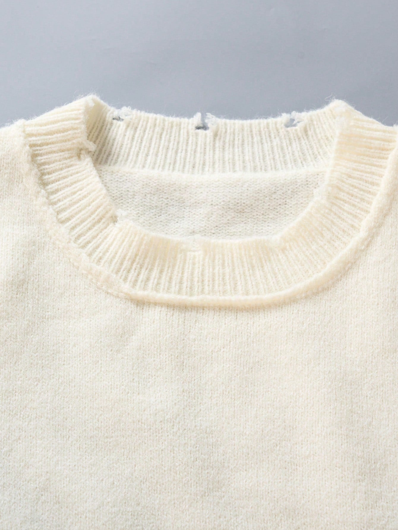ANDREILEE FRINGED AND WORN-OUT PULLOVER SWEATER
