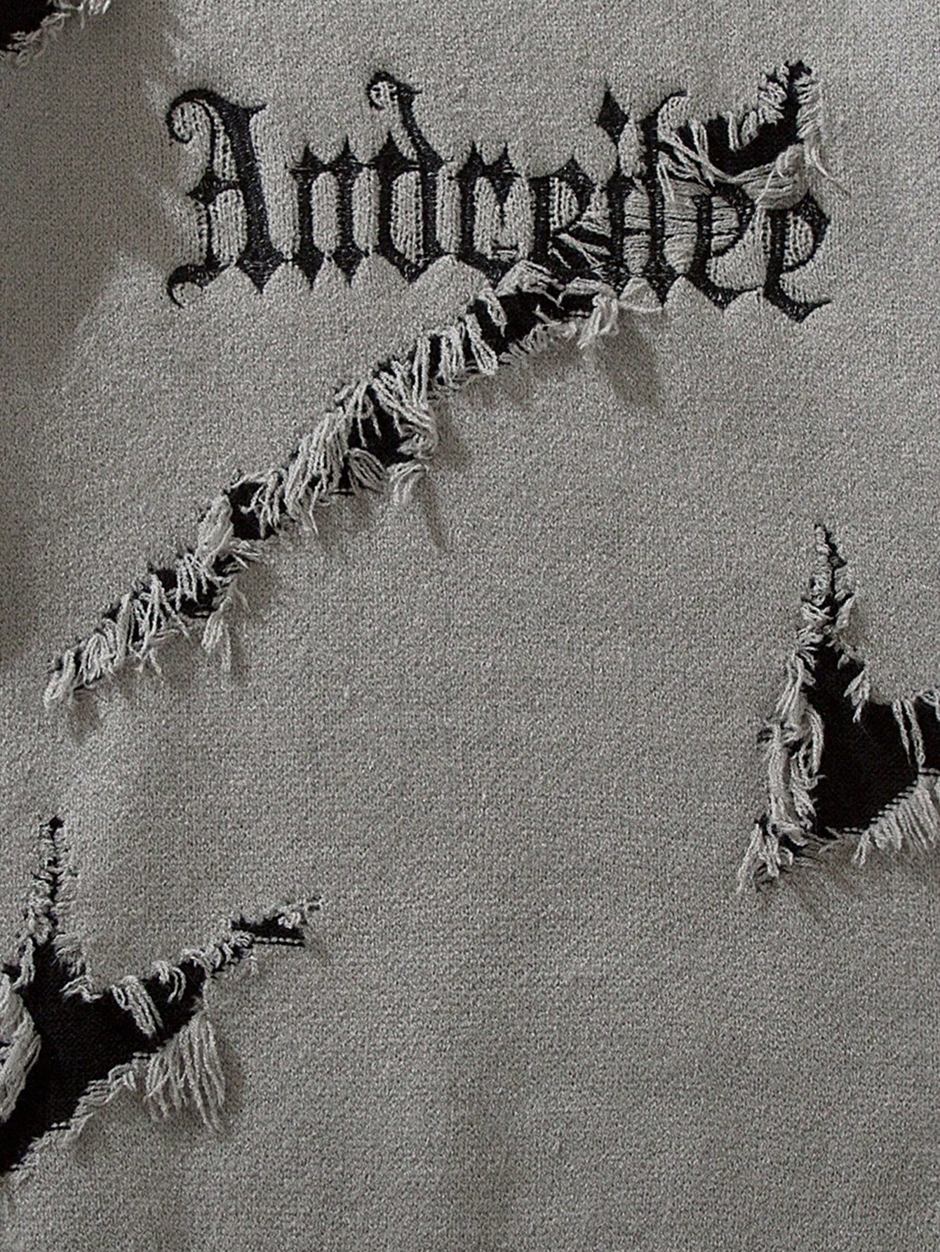 ANDREILEE EMBROIDERED LETTER SWEATER WITH HOLES