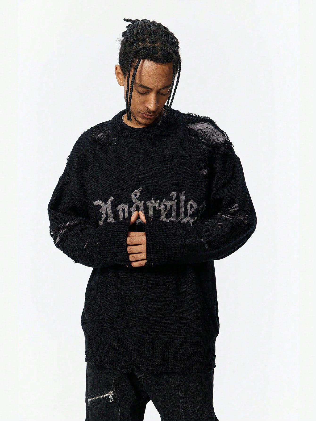 ANDREILEE BROKEN HOLE TASSEL SWEATER