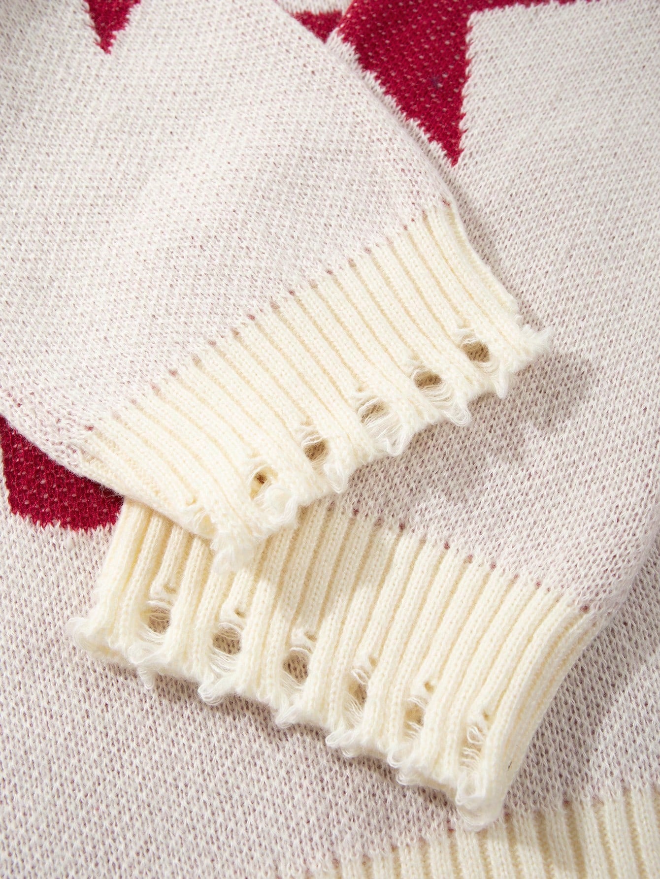 ANDREILEE LETTER-PATTERNED DISTRESSED SWEATER