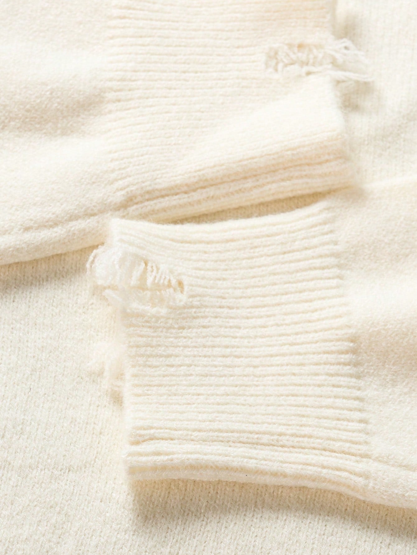 ANDREILEE FRINGED AND WORN-OUT PULLOVER SWEATER