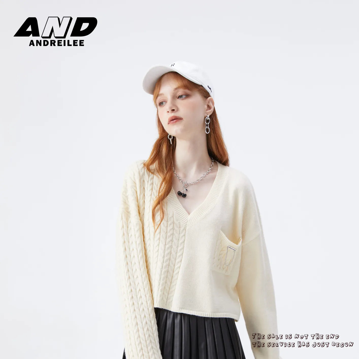 Asymmetric button-down V-neck sweater: loose fit